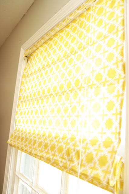 Learn how to make roman shades with mini blinds in just a few easy steps. These roman shades are inepensive to make and can be totally customizable!
