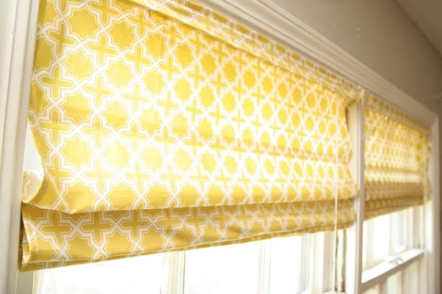 Learn how to make roman shades with mini blinds in just a few easy steps. These roman shades are inepensive to make and can be totally customizable!