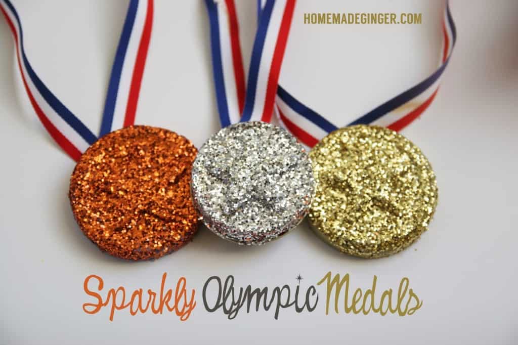 This easy olympic medal craft for kids uses old jar lids and glitter to make the cutest olympic medals in no time. This craft is great for all ages!