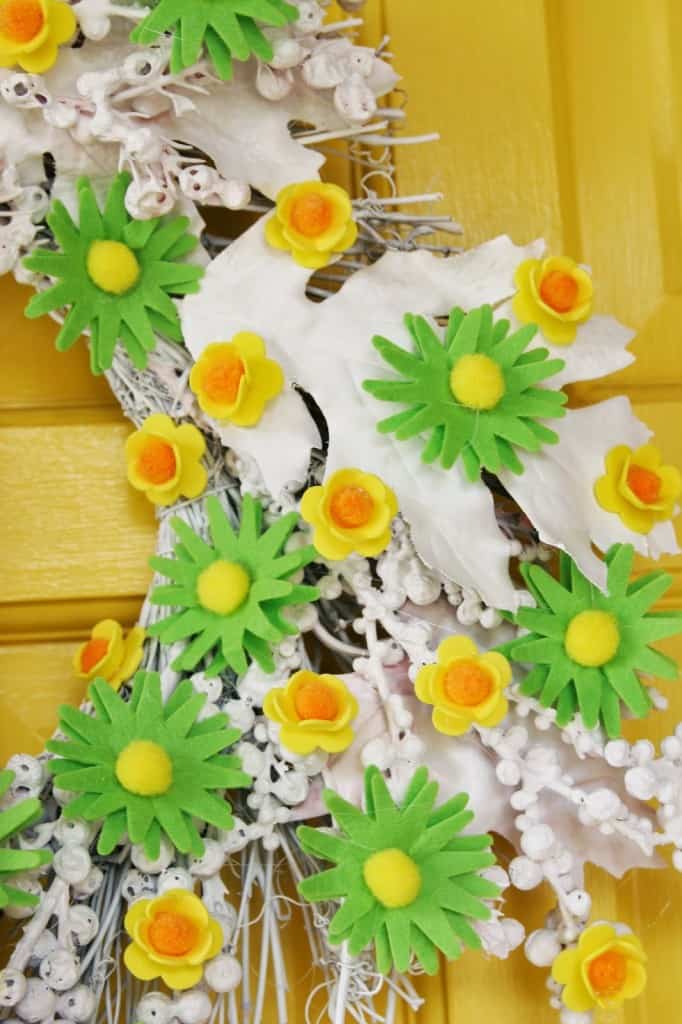 Transform an out of season wreath and turn into the perfect spring wreath with just a few supplies!