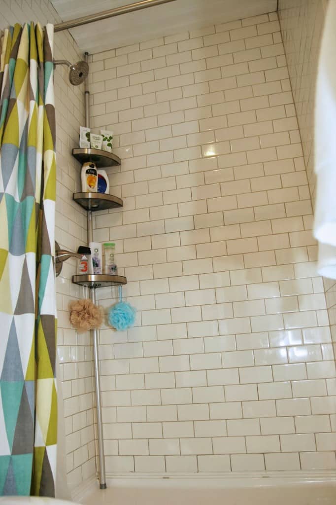 Learn all the tips and tricks on how to makeover a tiny bathroom on a budget!