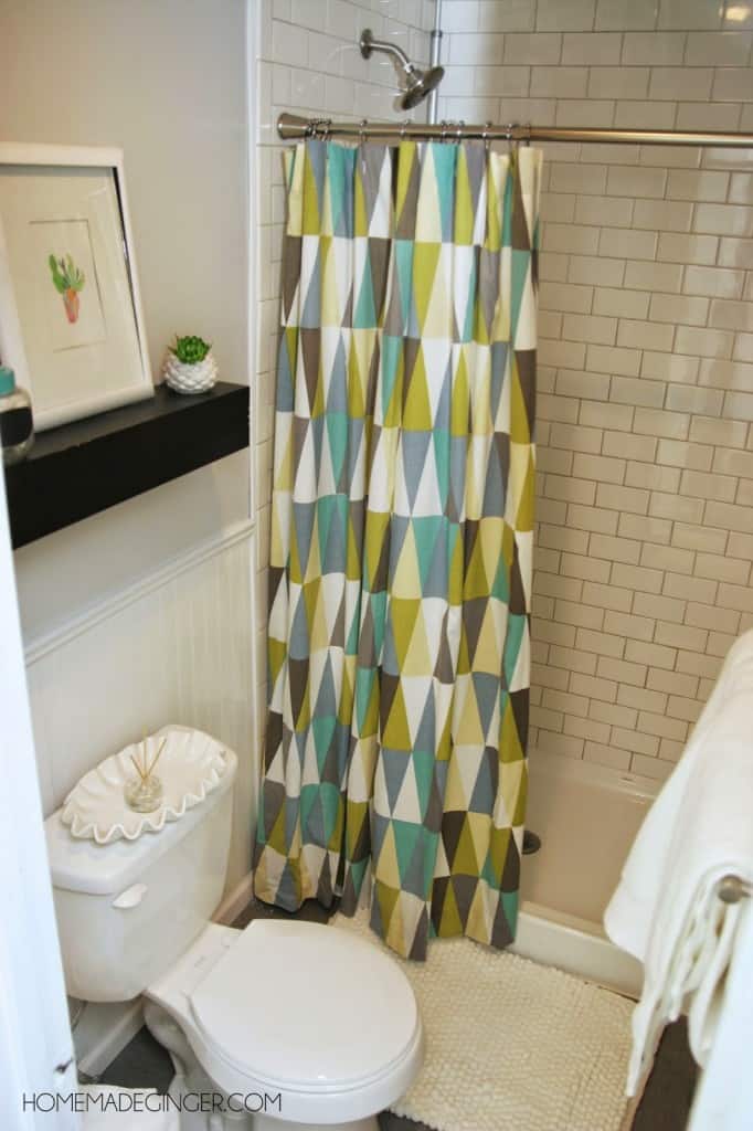 Learn all the tips and tricks on how to makeover a tiny bathroom on a budget!