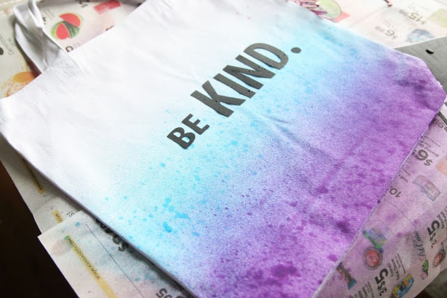 These tie dye sprayed canvas bags are super easy to make and can be personlized to say anything!