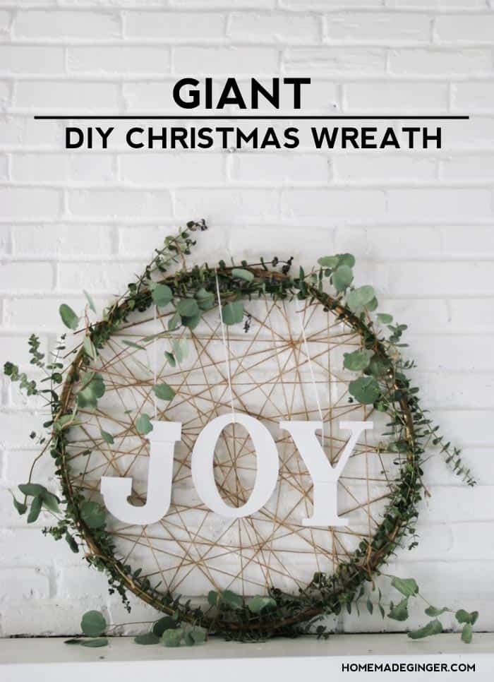 Make a giant Christmas wreath out of a hula hoop and eucalyptus for some rustic and modern holiday decor!