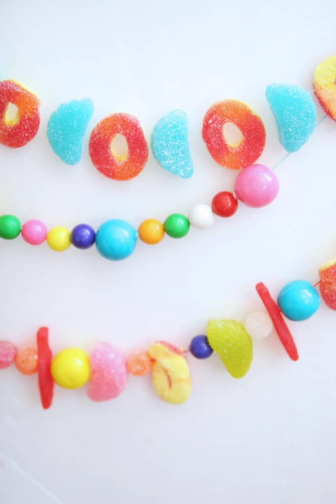 Make some DIY garlands using candy! These are so easy and festive, the hardest part will be not eating it all!