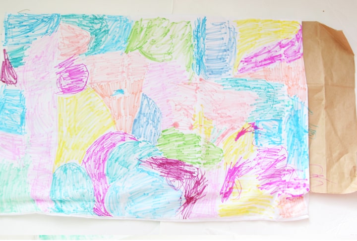 Create an easy pillowcase craft for kids using Sharpies and rubbing alcohol. You will get a beautiful watercolor effect that looks custom made!