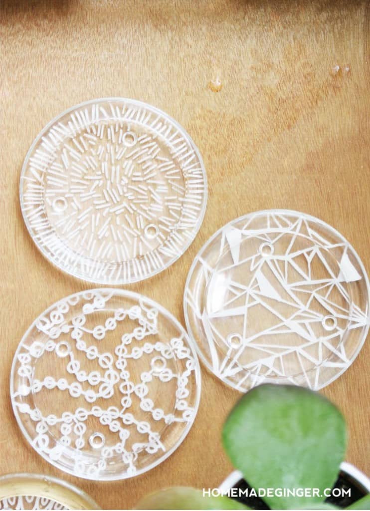 Turn small glass candle plates into DIY coasters! This easy and modern tutorial for DIY coasters is so quick and cheap to make!