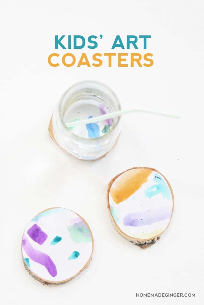 Turn kids art into adorable wood slice coasters! These DIY coasters couldn't be easier to make and look adorable displayed on the coffee table!