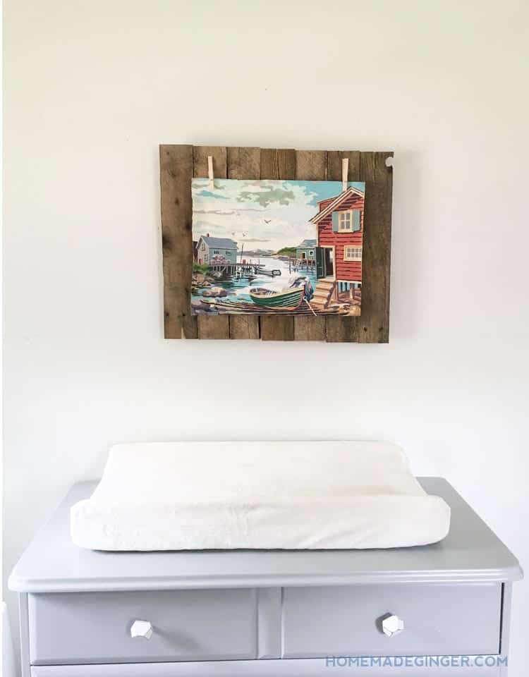 This easy pallet project is a great way to display an old painting without damaging it! Perfect for a boys nursery decor!