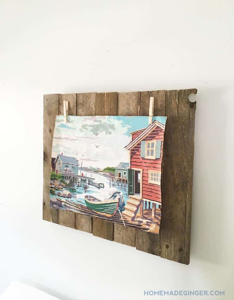 If you want to learn how to make a pallet picture display, then this is the perfect tutorial for you. It's so easy to make a pallet picture frame!