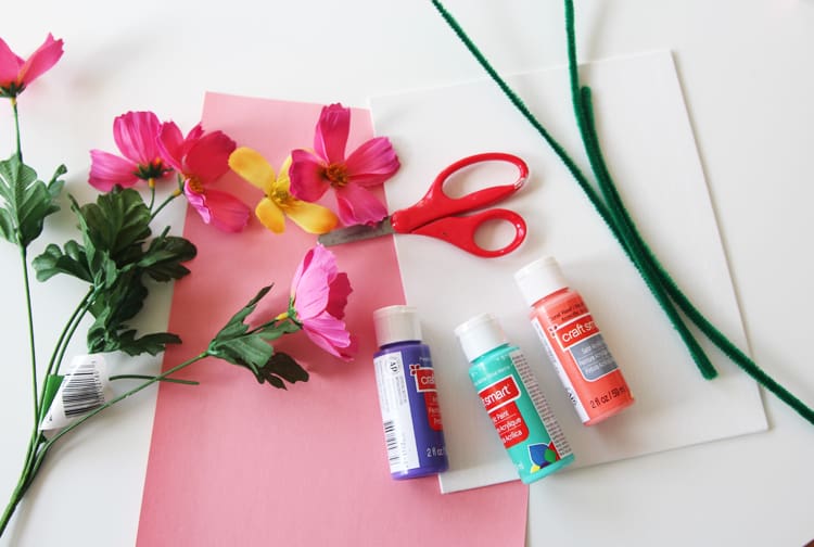 This fake flower craft idea is a PERFECT Mother's Day craft! Grab some materials from the dollar store and make this spring craft today!
