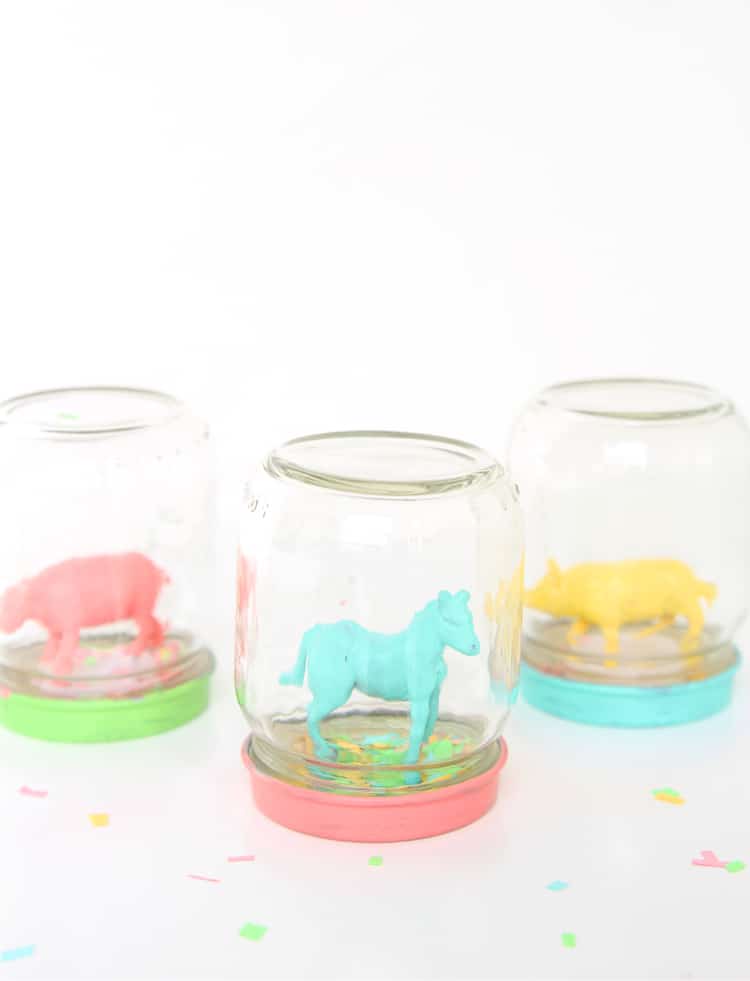 These DIY snow globes are perfect for spring or summer. Instead of snow, use bright colored confetti and place painted animals or other small toys on the inside