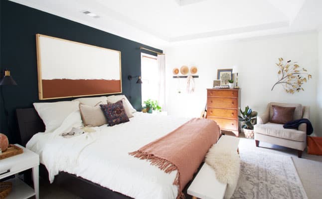 This master bedroom makeover reveal was done on a major budget. Lots of DIY home decor projects make this bedroom have character!