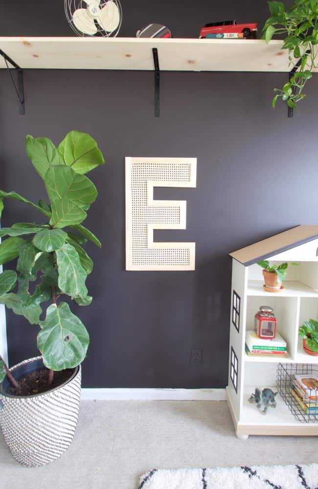 Make some DIY letter wall art using cane webbing. This modern letter wall art is easy to do and makes a big statement on any wall!