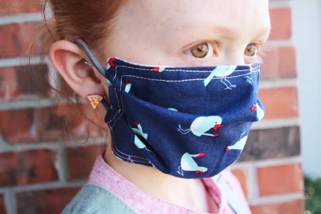 Learn how to make a face mask for kids using ponytail holders instead of elastic!